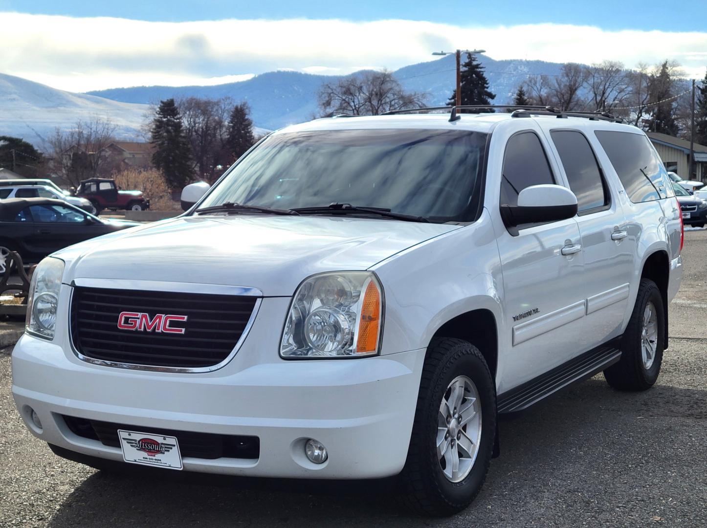 2011 White /Black GMC Yukon XL SLT SLT (1GKS2KE33BR) with an 5.3L V8 engine, 5 Speed Automatic transmission, located at 450 N Russell, Missoula, MT, 59801, (406) 543-6600, 46.874496, -114.017433 - Nice 4WD SUV. 5.3L V8. 3rd Row Seating. Power Sunroof. Rear Entertainment. Heated Leather Seats. Air. Cruise. Tilt. Power Windows and Locks. Running Boards. Towing. Clean Carfax. - Photo#1